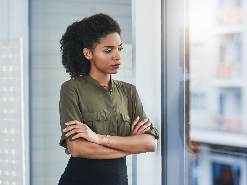 woman executive looking outside the window