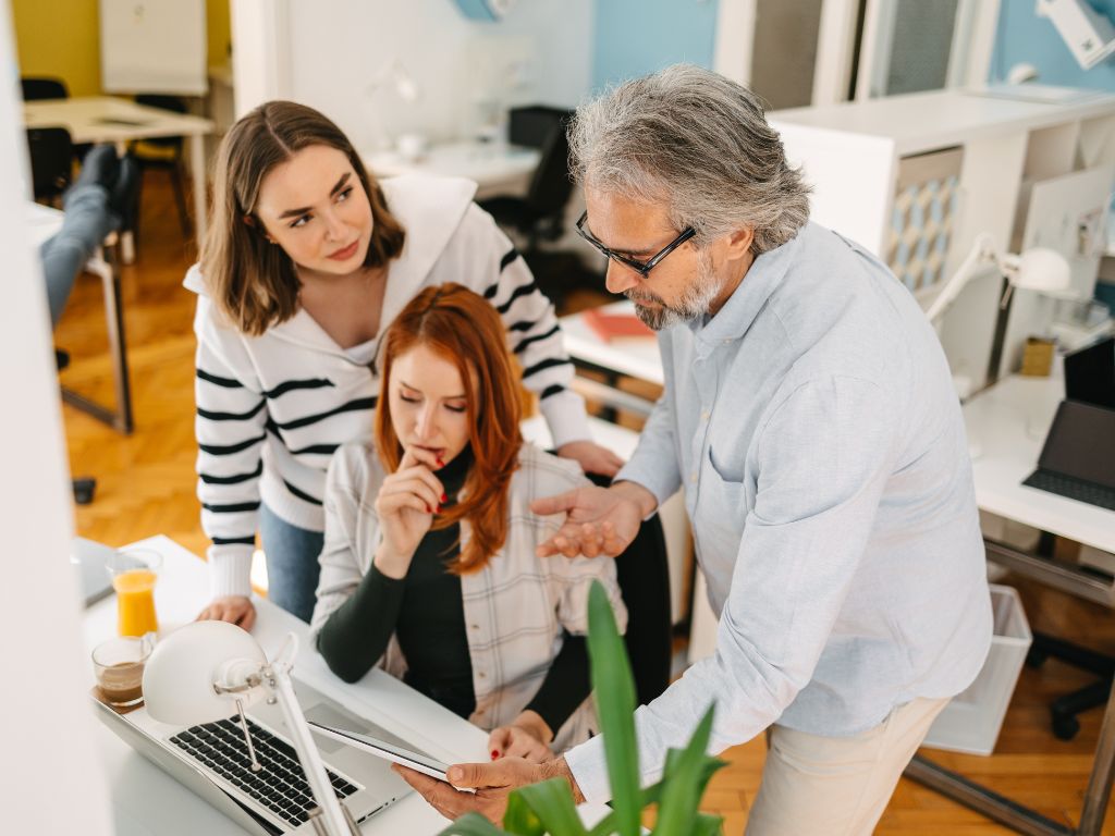 leader explaining task to female employee